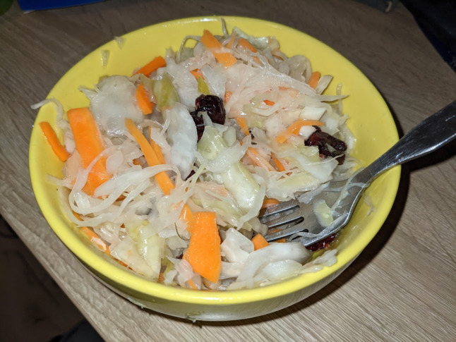 Sourkraut in a bowl with raisings